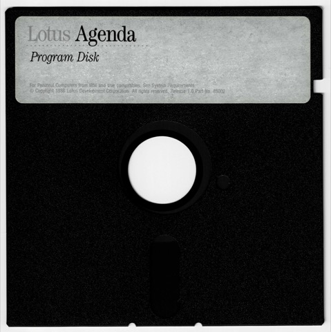The Lotus Agenda Release 1.0 program disk, 5.25 inch, with a grey label reading Lotus Agenda, Program Disk, and a copyright line.